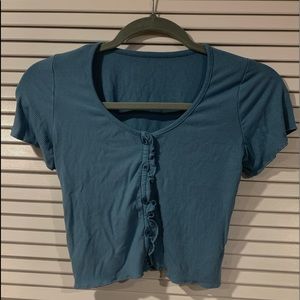 Blue cropped shirt
